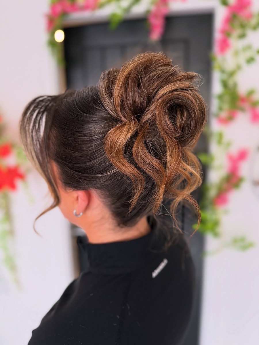 Textured updo finished with flowers